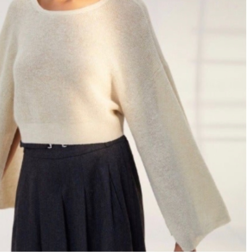 Babaton gold sweater